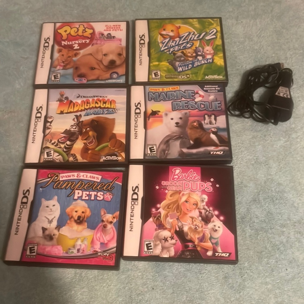 6 Nintendo DS games in a charger